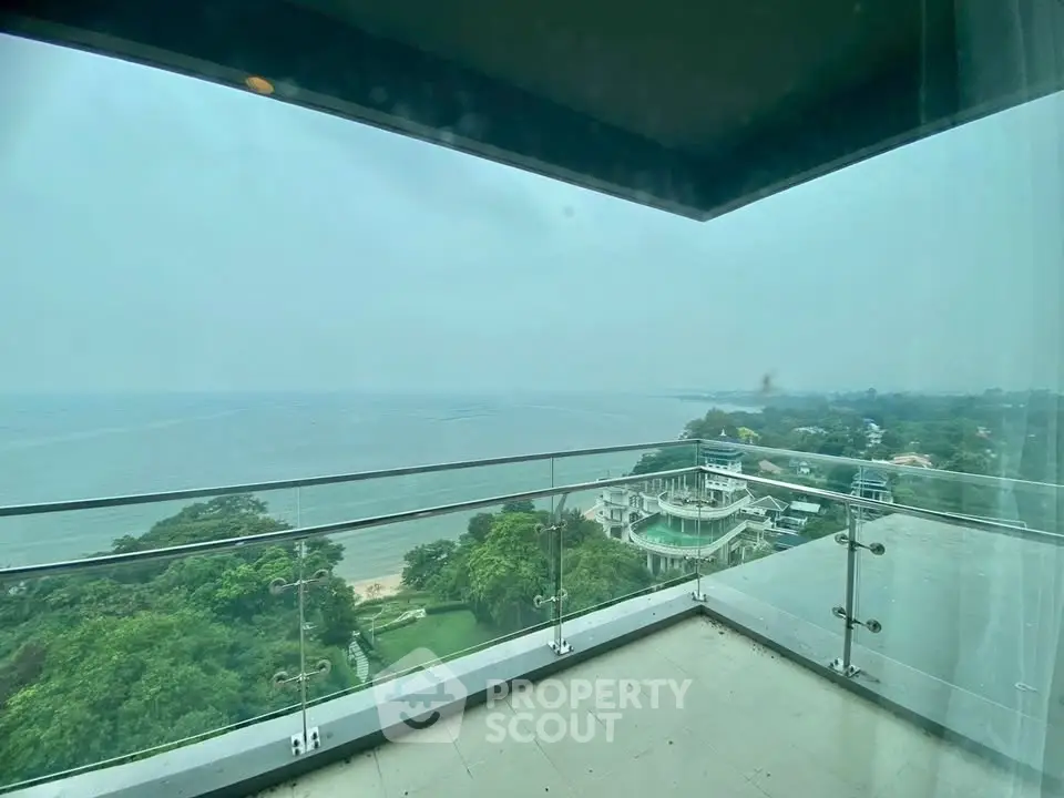 Stunning ocean view from a high-rise balcony, perfect for relaxation and enjoying serene coastal scenery.