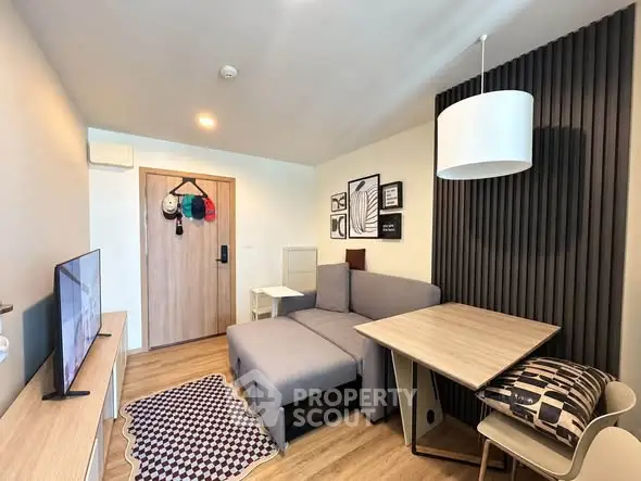 Modern living room with stylish decor and cozy furniture in a contemporary apartment.