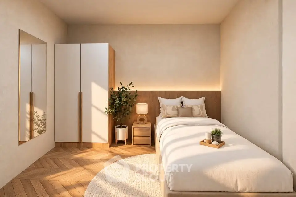 Cozy minimalist bedroom with wooden flooring, stylish wardrobe, and soft lighting.