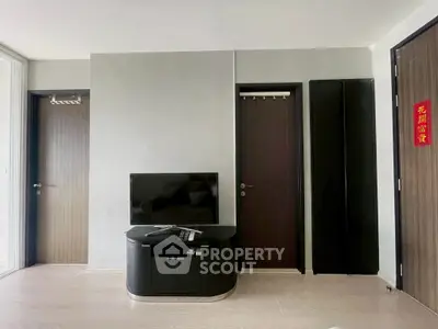 Modern living room with sleek TV stand and minimalist decor