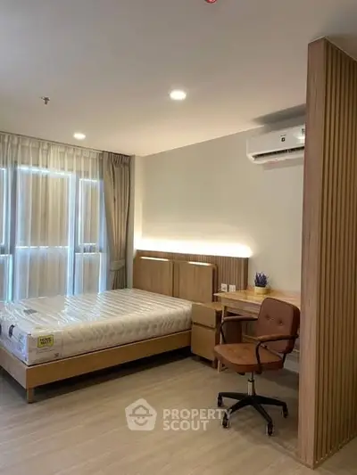 Modern bedroom with wooden furniture and natural light