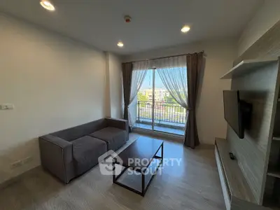 Modern living room with balcony view and sleek furniture