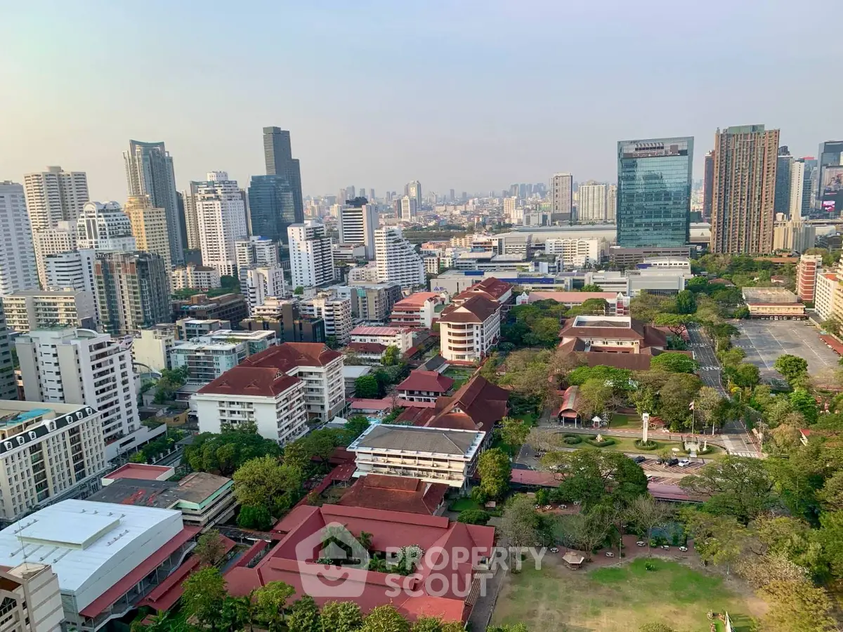 Stunning cityscape view showcasing modern skyscrapers and lush greenery, perfect for urban living enthusiasts.