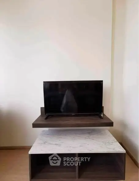 Modern living room with sleek TV stand and minimalist decor