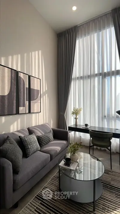 Modern living room with high ceilings and stylish decor