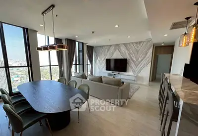 Luxurious modern living room with panoramic city views and elegant dining area.
