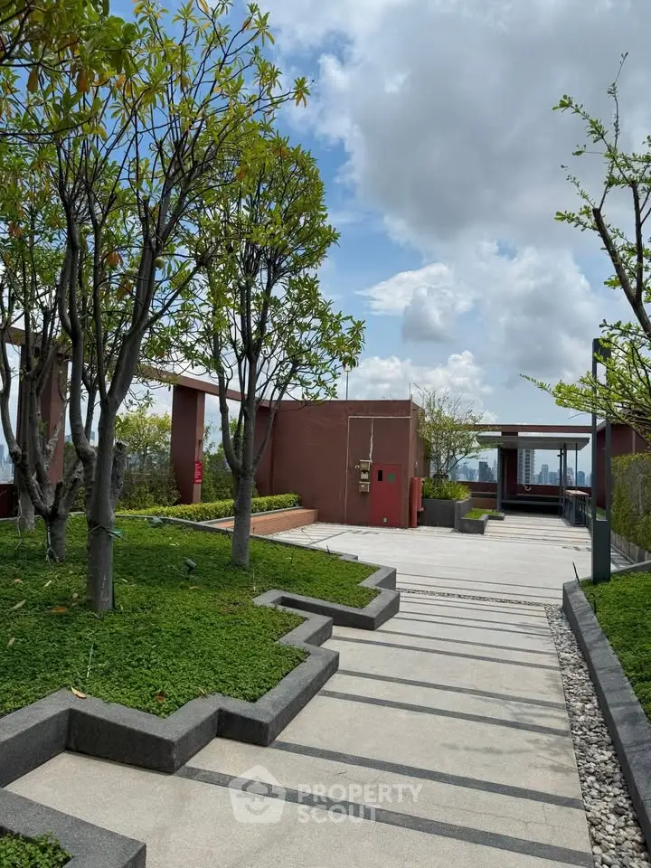 Stunning rooftop garden with lush greenery and modern design, offering a serene urban escape.