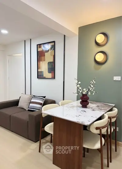 Modern living room with stylish dining area and contemporary decor