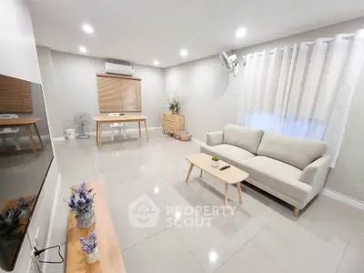 Spacious modern living room with elegant decor and natural light