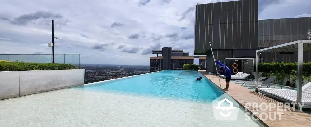 Luxurious rooftop infinity pool with stunning cityscape view