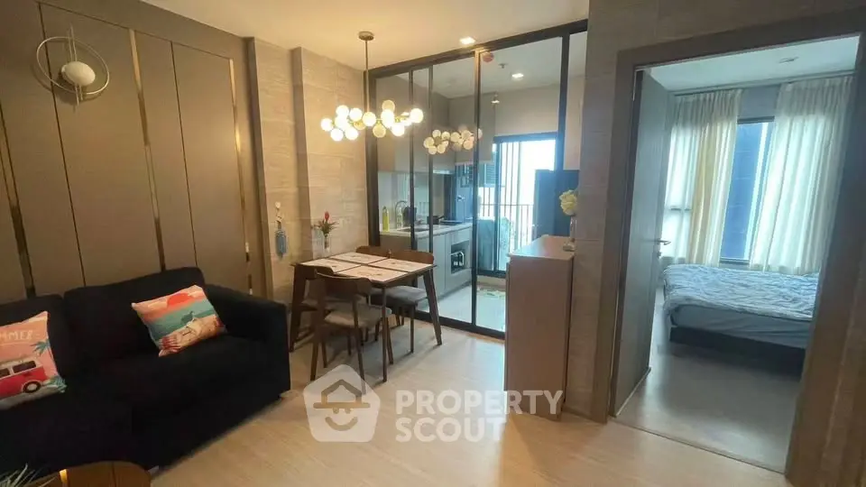 Modern apartment interior with open layout, stylish lighting, and cozy bedroom.