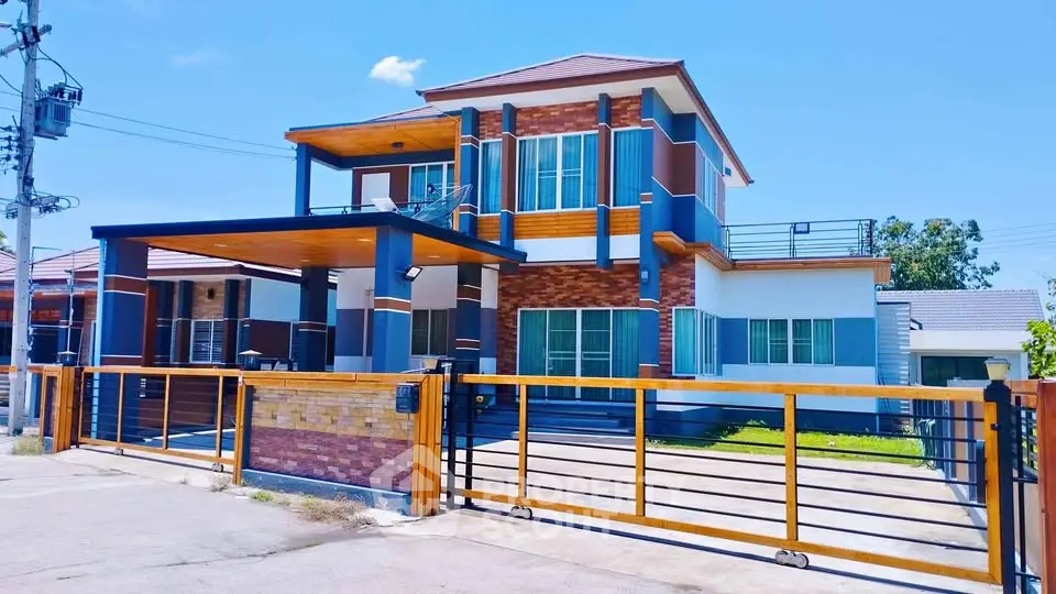 Stunning modern two-story house with spacious driveway and elegant brick facade.