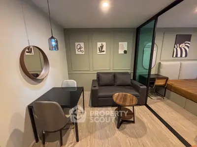 Modern living room with stylish decor and glass partition