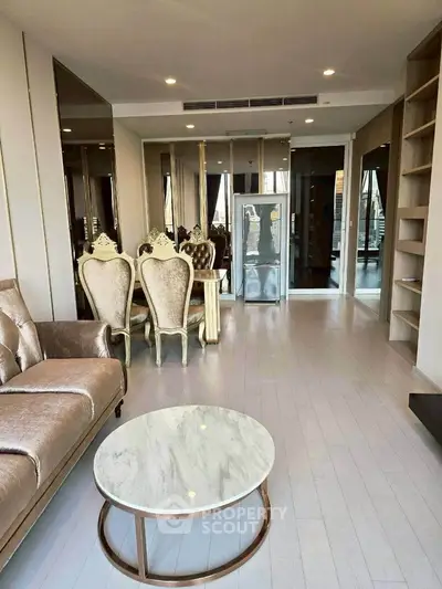 Luxurious living room with elegant furniture and modern decor in a stylish apartment.