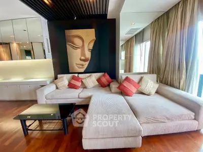 Luxurious living room with elegant sectional sofa and artistic wall decor