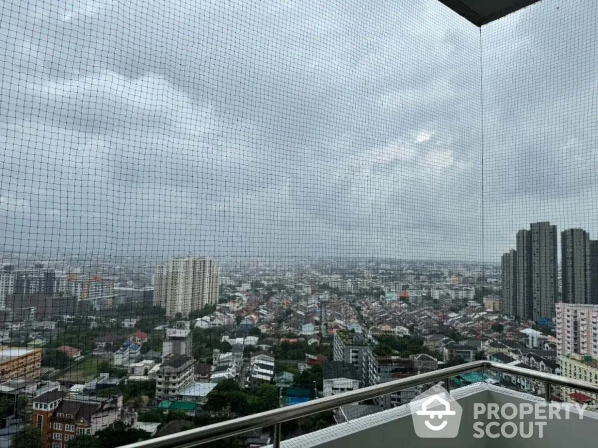 Stunning cityscape view from high-rise balcony with expansive skyline