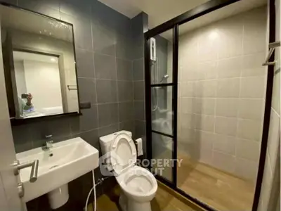 Modern bathroom with sleek design and glass shower enclosure