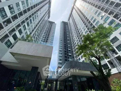 Stunning high-rise residential buildings with modern architecture and lush greenery.