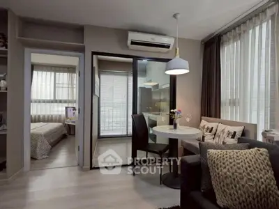 Modern apartment interior with cozy living area and stylish dining space