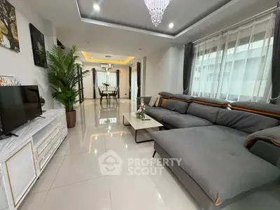 Spacious modern living room with elegant decor and large sectional sofa