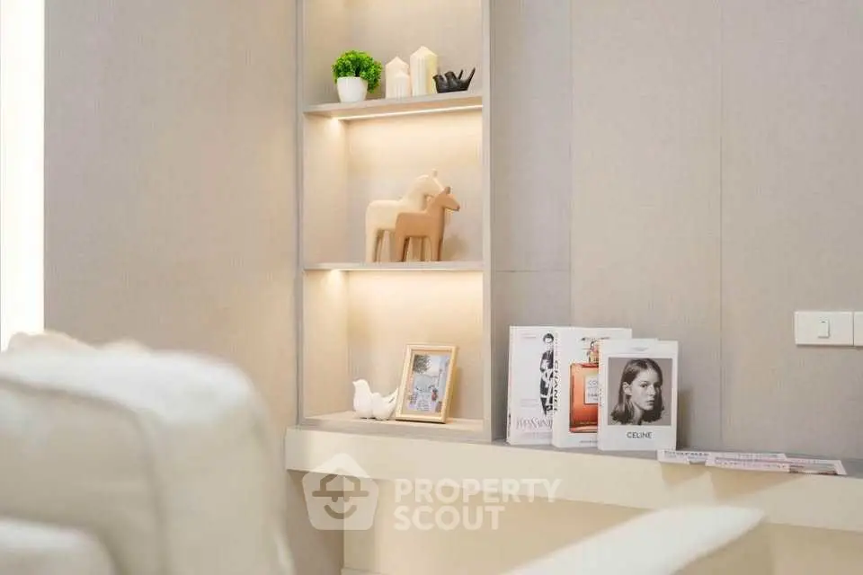 Modern living room with stylish decor and built-in shelving