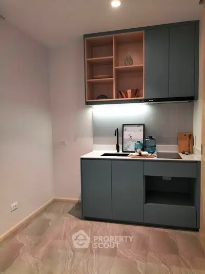 Modern kitchen with sleek cabinetry and stylish decor