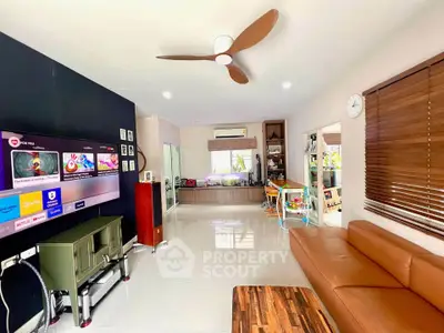 Spacious modern living room with stylish decor and entertainment setup