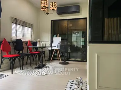 Chic modern living room with stylish decor and ample natural light, perfect for urban living.