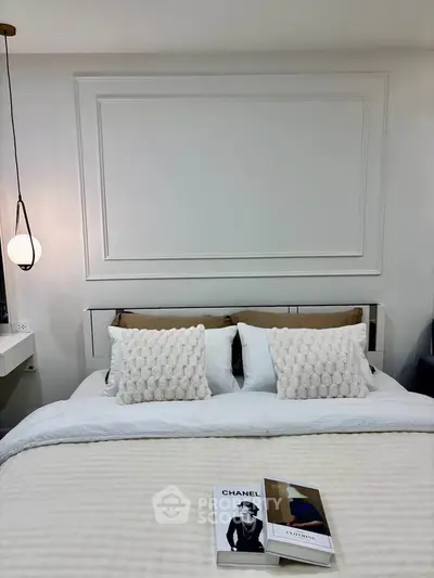 Elegant bedroom with stylish decor and cozy bedding, perfect for relaxation and comfort.