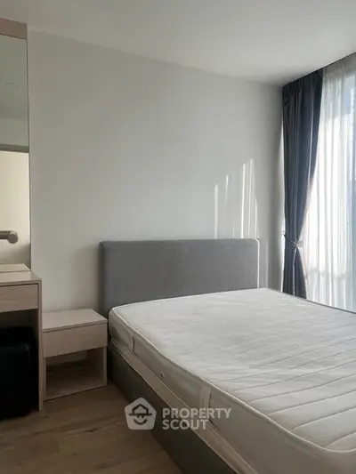 Bright and airy bedroom with modern furnishings and natural light