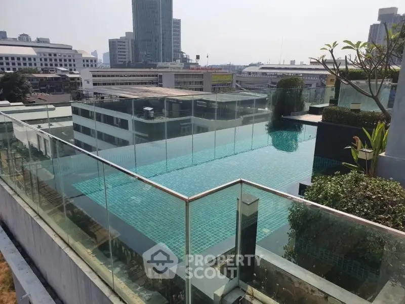 Stunning rooftop pool with city skyline views, perfect for luxury urban living.