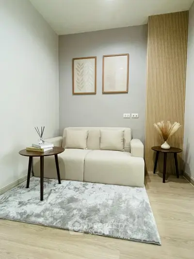 Cozy living room with modern decor and neutral tones