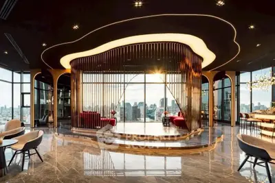 Luxurious modern living room with panoramic city view and elegant interior design.