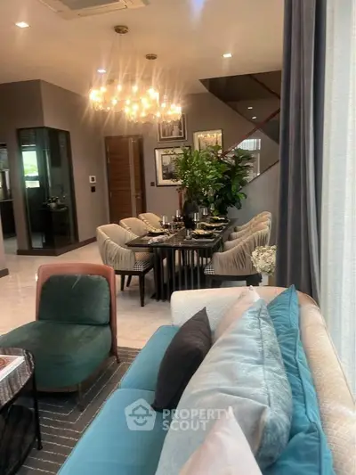 Luxurious living room with elegant dining area and modern decor