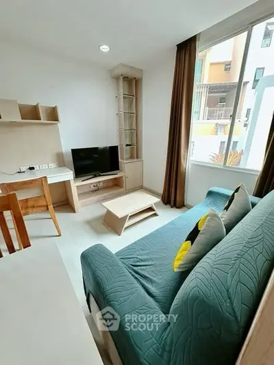 Modern living room with stylish furniture and natural light