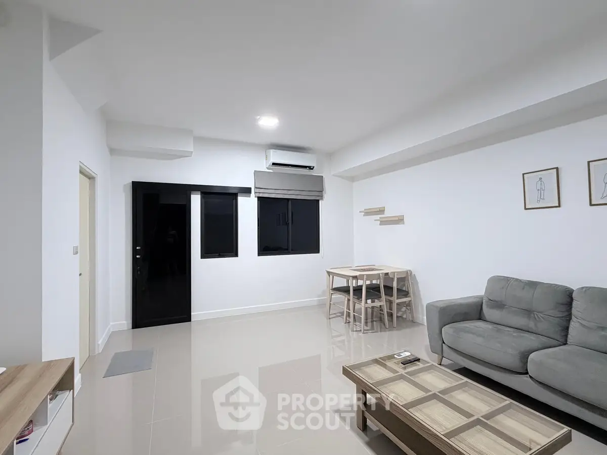 Modern living room with sleek furniture and minimalist decor