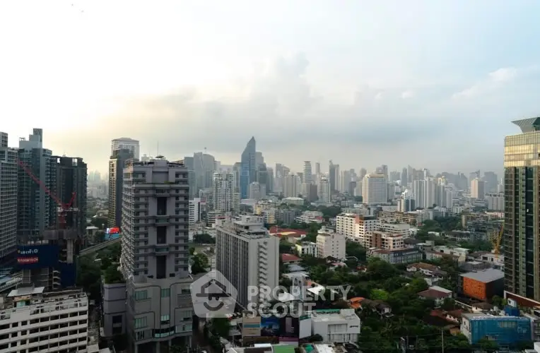 Stunning cityscape view showcasing modern high-rise buildings and lush greenery, perfect for urban living enthusiasts.