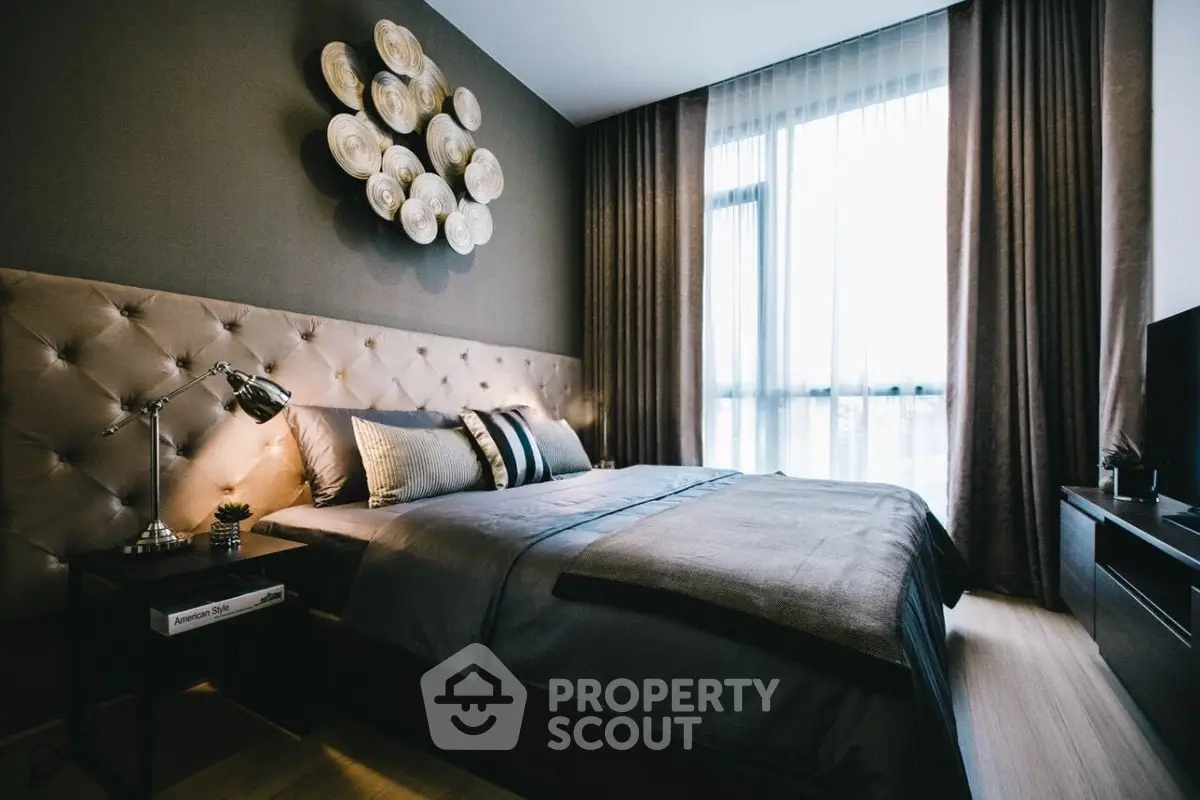 Luxurious modern bedroom with elegant decor and large window