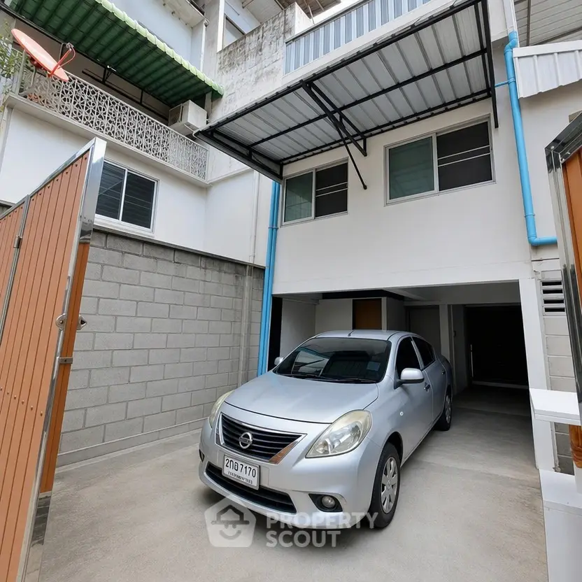 Spacious residential parking area with covered carport and modern design.