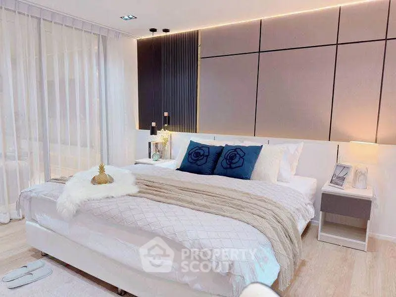 Luxurious modern bedroom with elegant decor and ambient lighting
