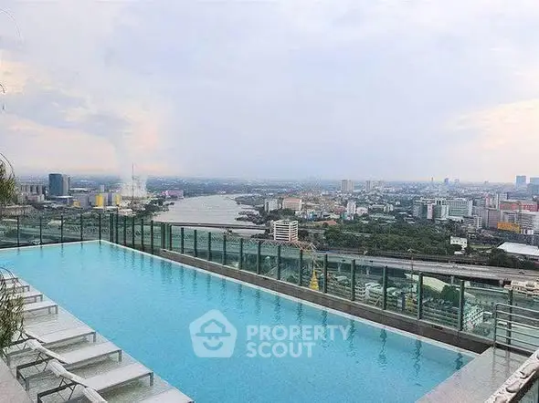 Stunning rooftop pool with panoramic city views, perfect for luxury living.