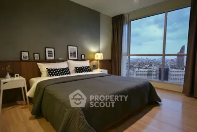 Luxurious bedroom with stunning city view and modern decor