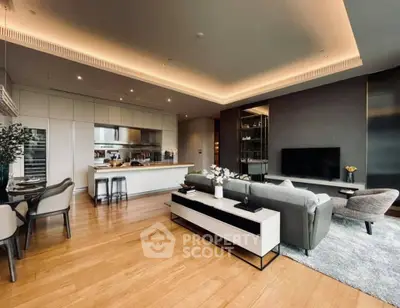 Luxurious open-plan living room with modern kitchen and elegant decor
