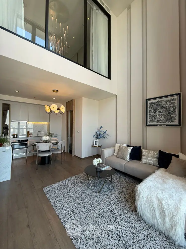 Luxurious modern living room with high ceilings and elegant decor