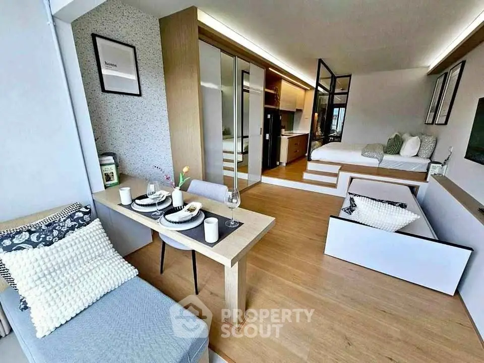 Modern open-plan studio apartment with stylish decor and natural light