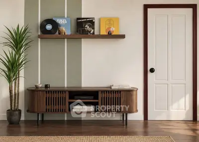 Stylish living room with modern wooden console, vinyl records, and potted plant, showcasing elegant interior design.