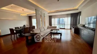 Spacious modern living room with elegant decor and city view, perfect for luxury urban living.