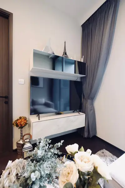 Stylish living room with modern TV setup and elegant decor