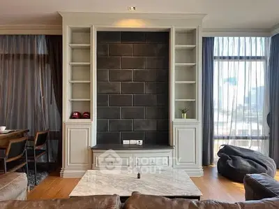 Stylish living room with modern shelving and large windows