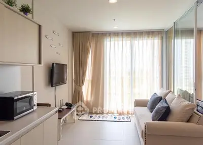 Bright and cozy living room with modern decor and large window view